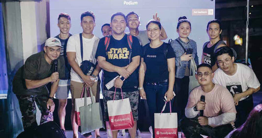Winners, participants, and hosts at the PMC iPhone 14 Midnight Launch