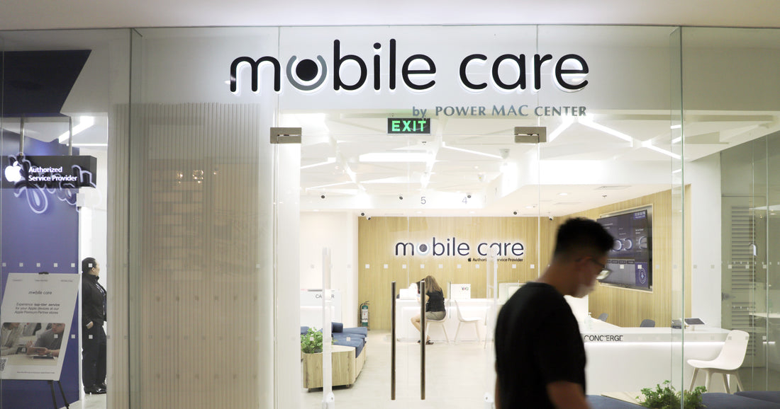 Man standing outside a Mobile Care branch