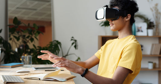 Teenage boy using VR lenses